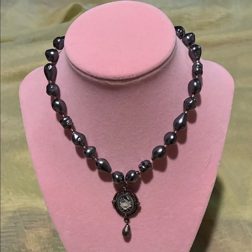 Elegant Black Pearl Necklace with floral pendant